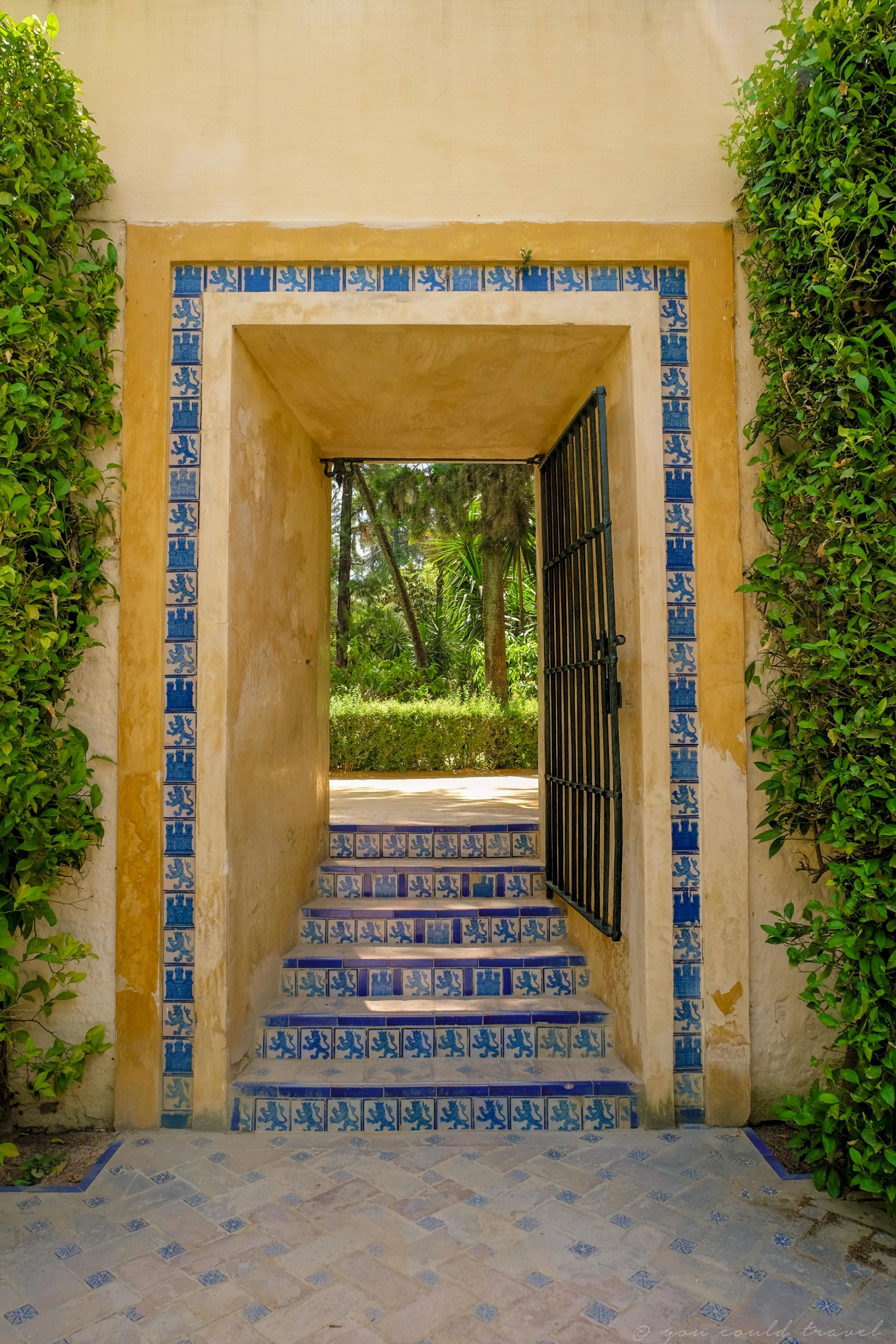 A doorway which leads to more vegetation in Seville Spain A doorway which leads to more vegetation in Seville Spain