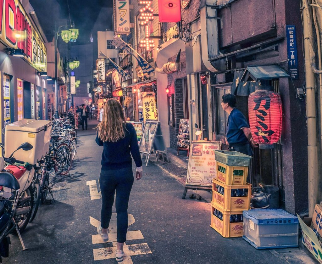 Cory from You Could Travel exploring the neon streets in Shinjuku