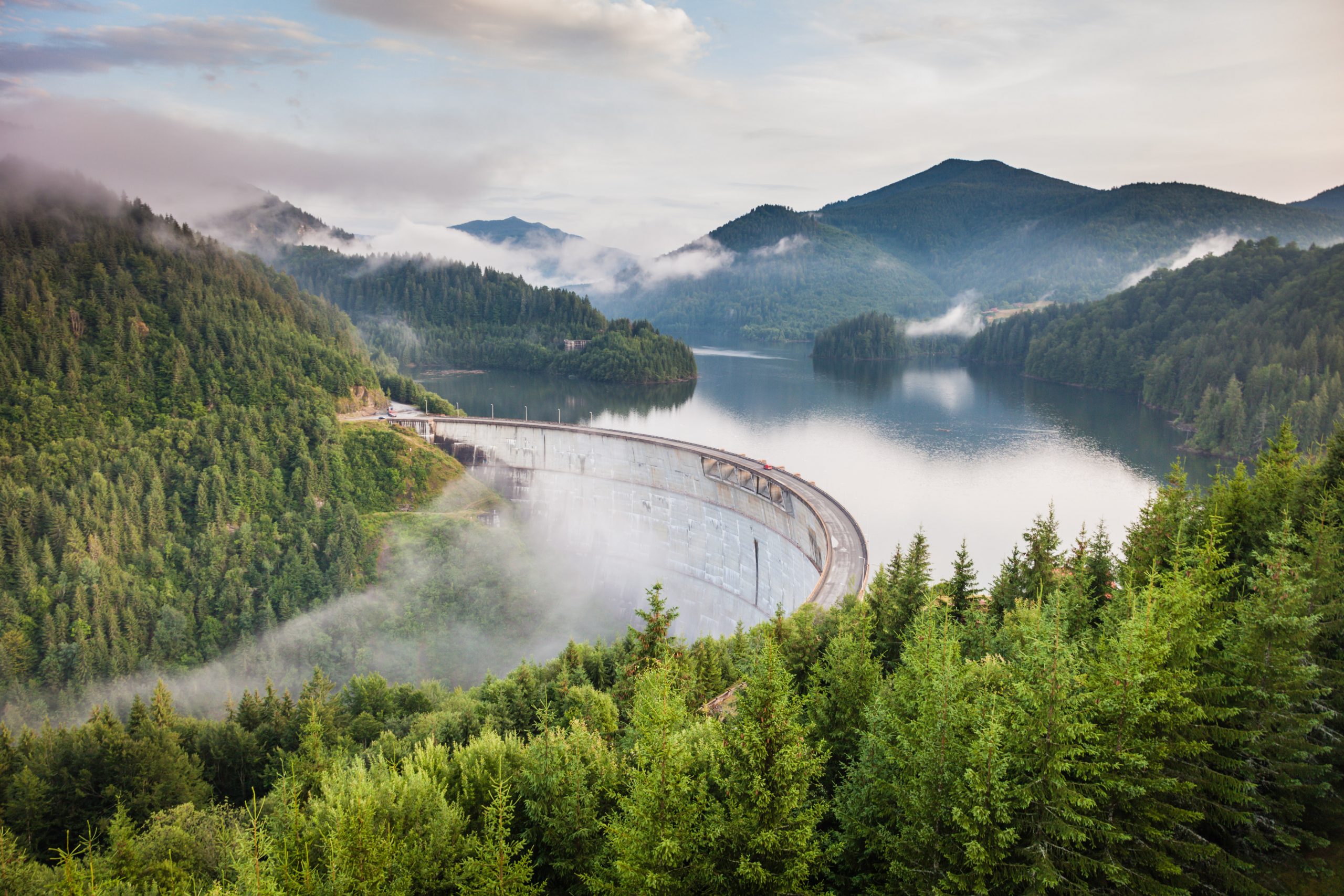 Spring in Romania with fog at the vidraru dam