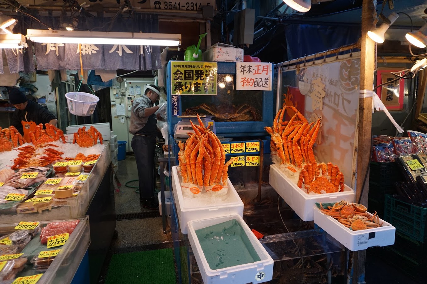 Tsukiji Market Shellfish Man preparing his stall at Tsukiji Outer Market