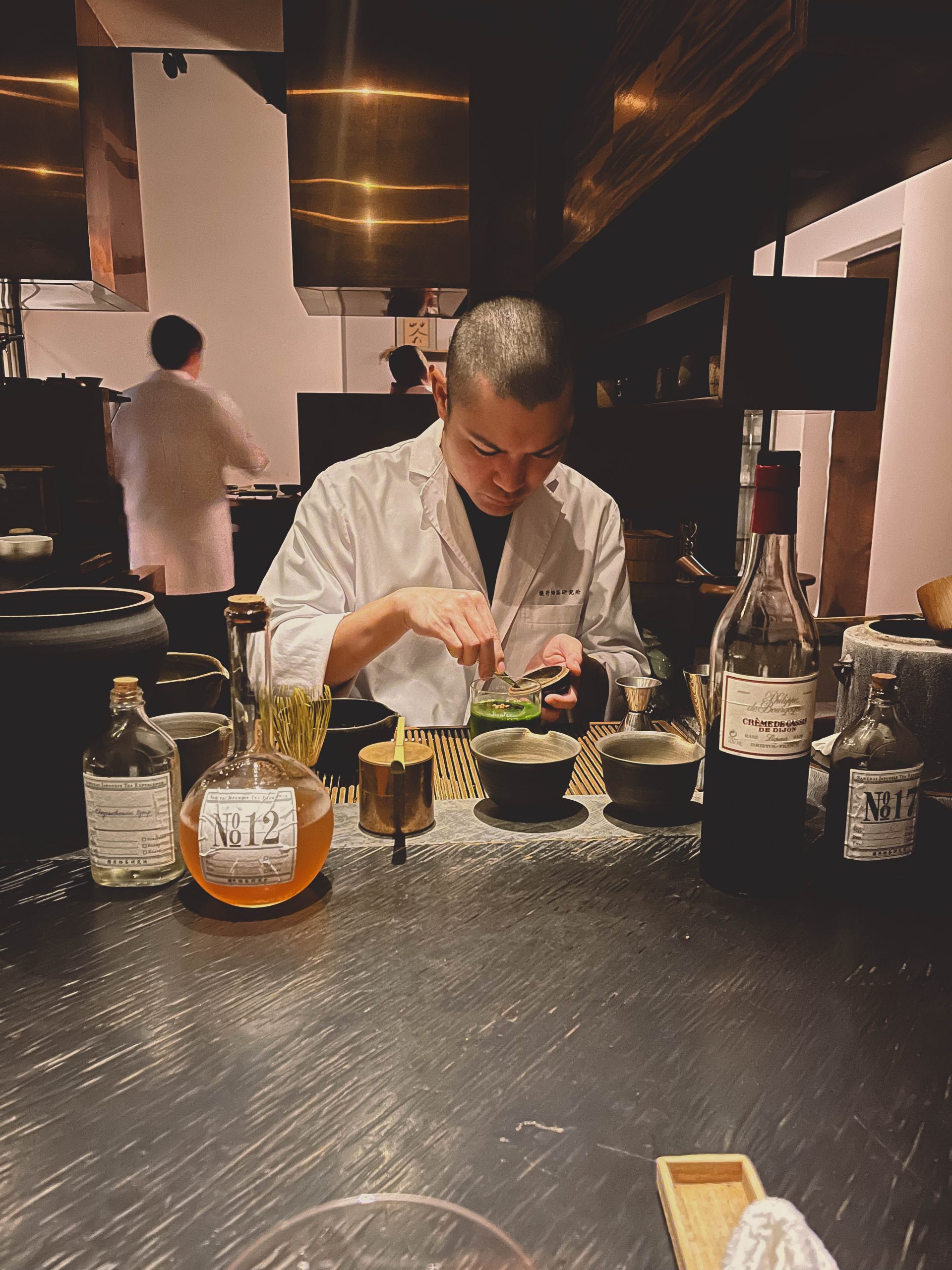 Tea master making the matcha at Sakurai tea experience