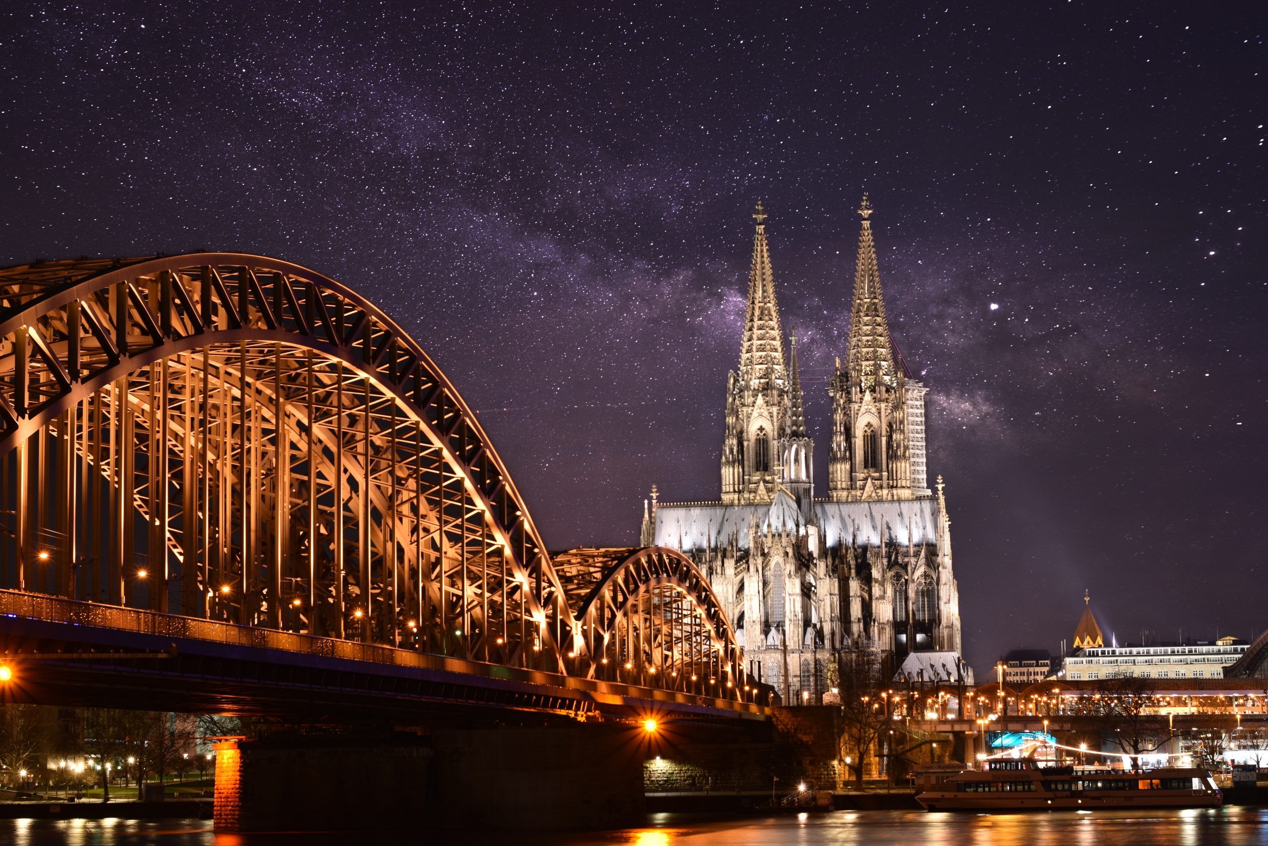 The city of cologne at nighttime