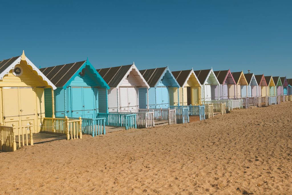 Things to do in Essex visit Mersea island with its colourful huts