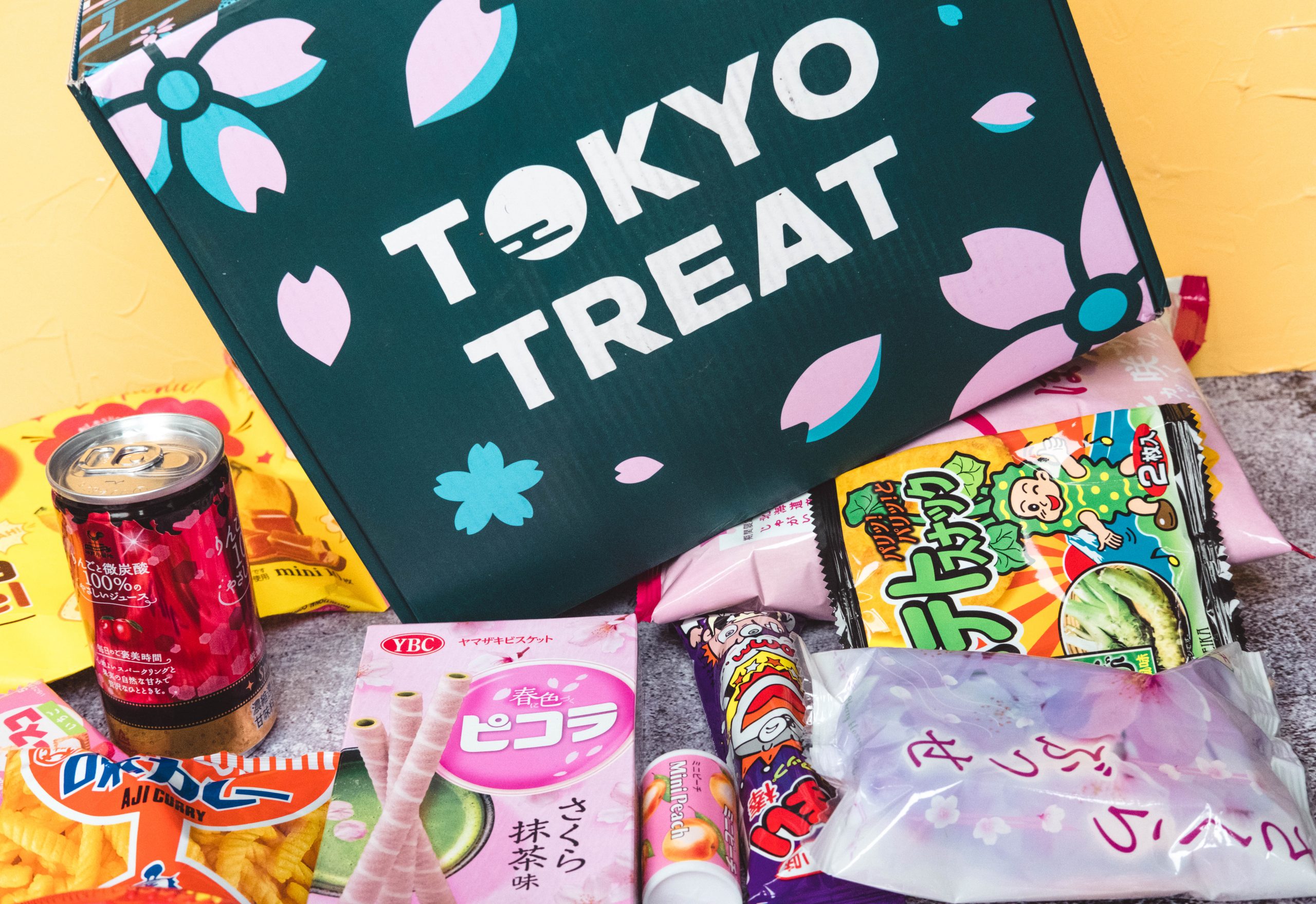 Tokyo treat box with some of its contents Tokyo treat box with some of its contents