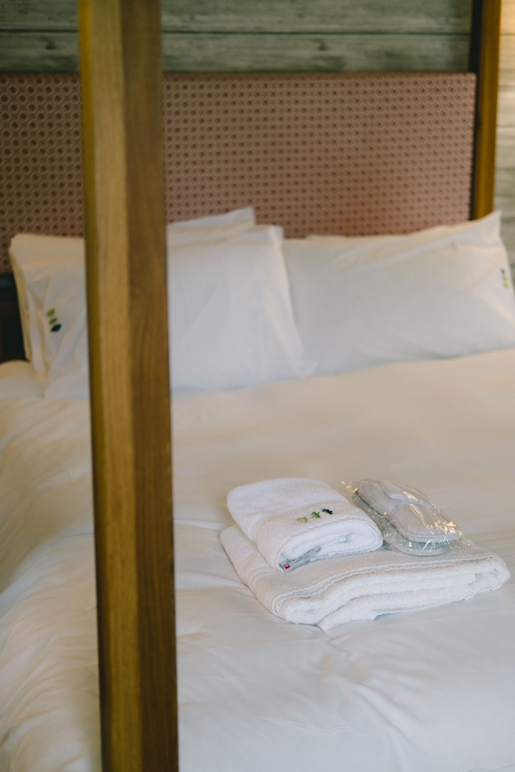 towels and slippers in the master bedroom sherwood hideaway