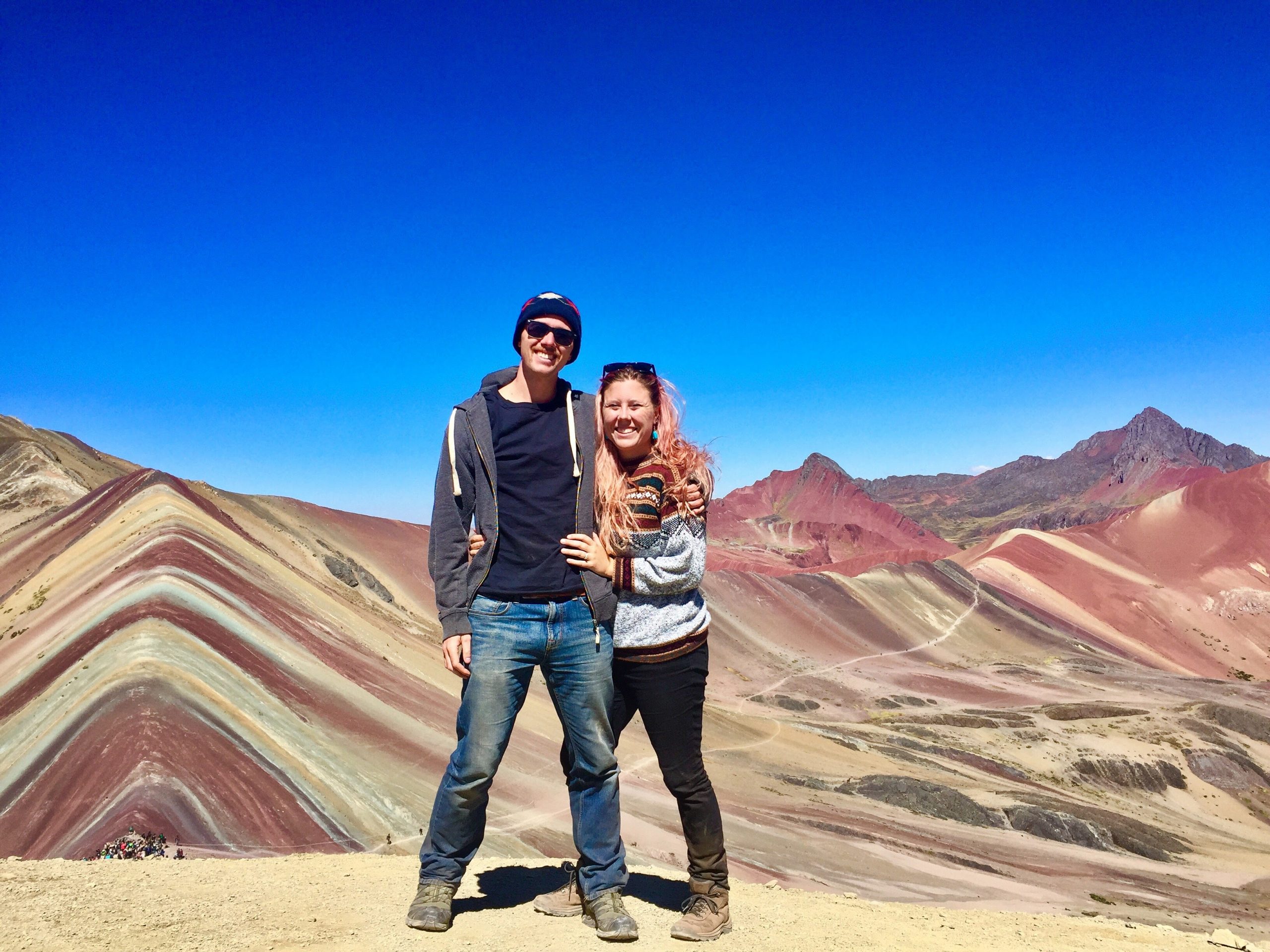 Travel couple Rainbow Mountains Travel couple Rainbow Mountains
