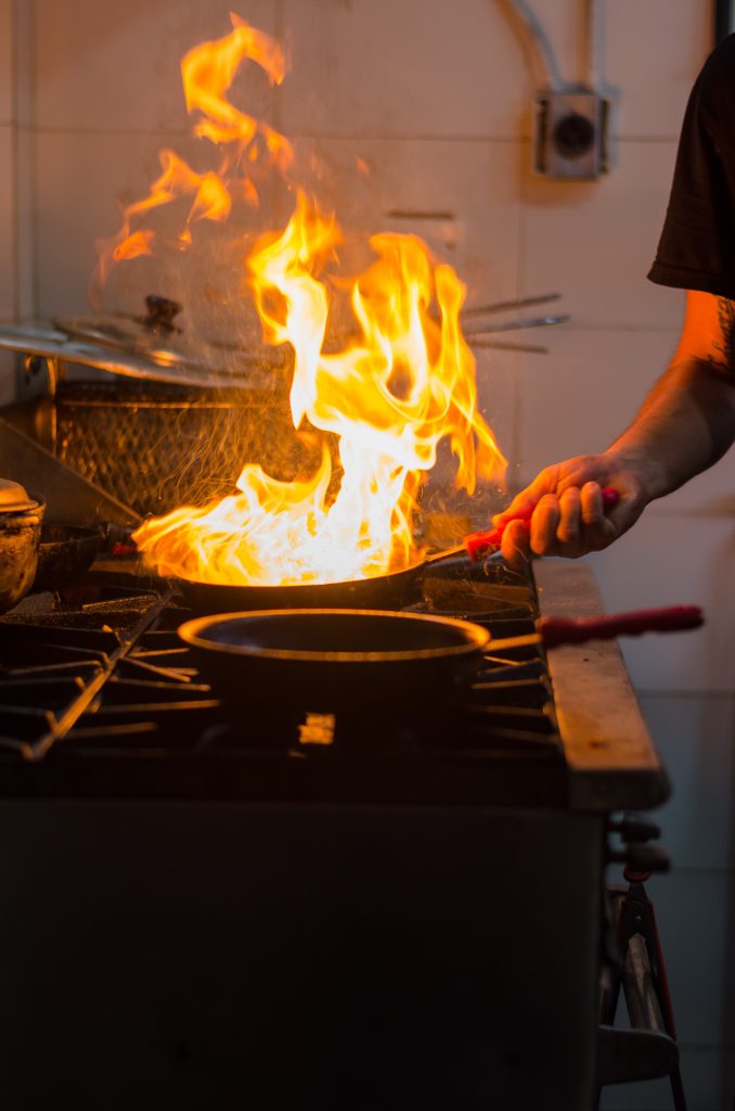 Venezuelan food being cooked on fire