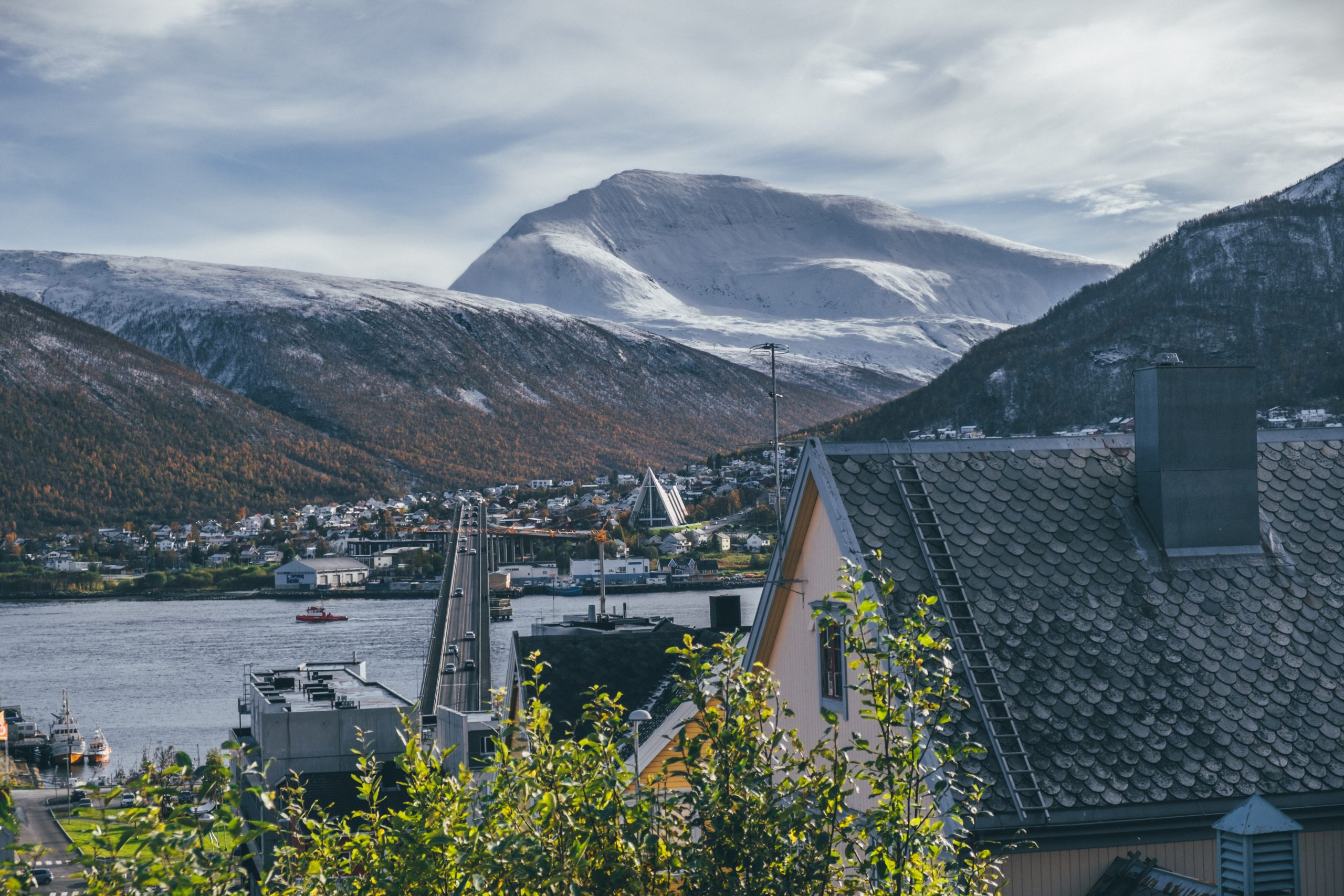 Visit tromso with its beautiful arctic mountains