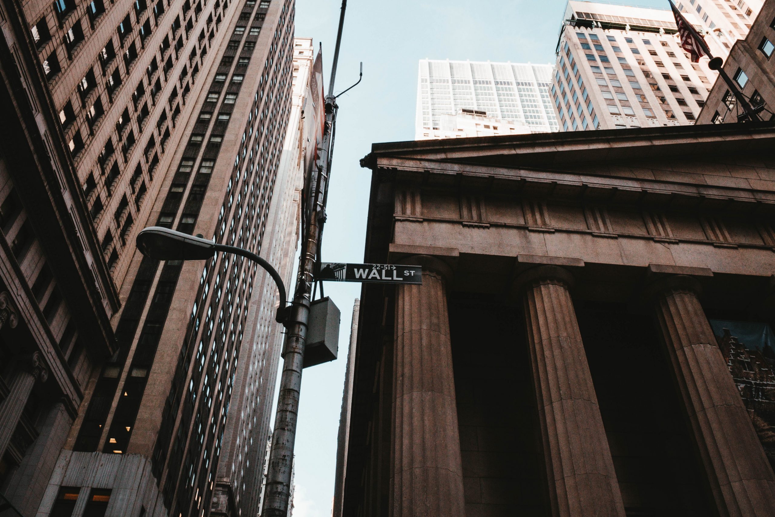 Wall street in the Financial District in NYC - stay here for a quiet and great time in NYC