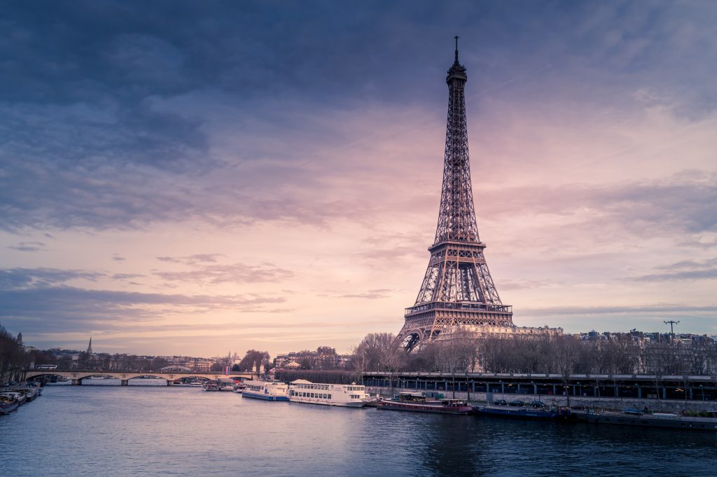 A view of Eiffel Tower and Seine just after the sun has set