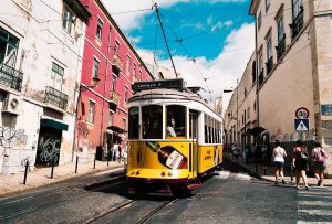 Where to stay in Lisbon - tram no 28 going through Alfama