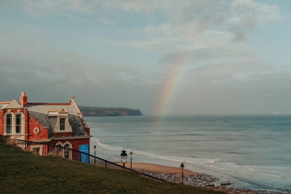 Whitby Sands with a rainbow