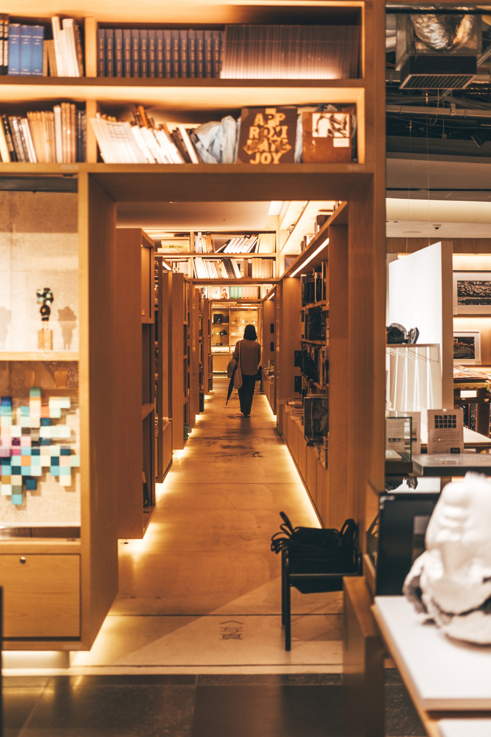 Woman walking in Tsutaya bookstore in Ginza Six